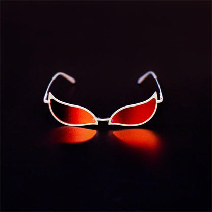 Tech Sense Sunglasses Cat Eye Glasses with red lenses on a dark background.