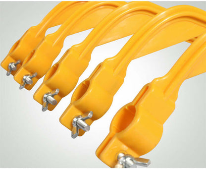 Golf Arm Corrector Golf Swing Practice Products in yellow plastic, designed for improving golf swing mechanics.