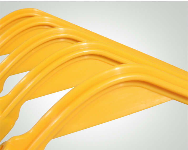 Golf Arm Corrector Golf Swing Practice Products - close-up of yellow training aid for golf swing improvement.